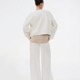Wide-leg jeans in white cotton denim. Princessmd pants have a high waist with elastic and front and back pockets. The model is 175 cm and wears a size S/36.

Style the pants with matching jacket: princessmd short jacket

Material:
100% Cotton