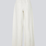 Wide-leg jeans in white cotton denim. Princessmd pants have a high waist with elastic and front and back pockets. The model is 175 cm and wears a size S/36.

Style the pants with matching jacket: princessmd short jacket

Material:
100% Cotton