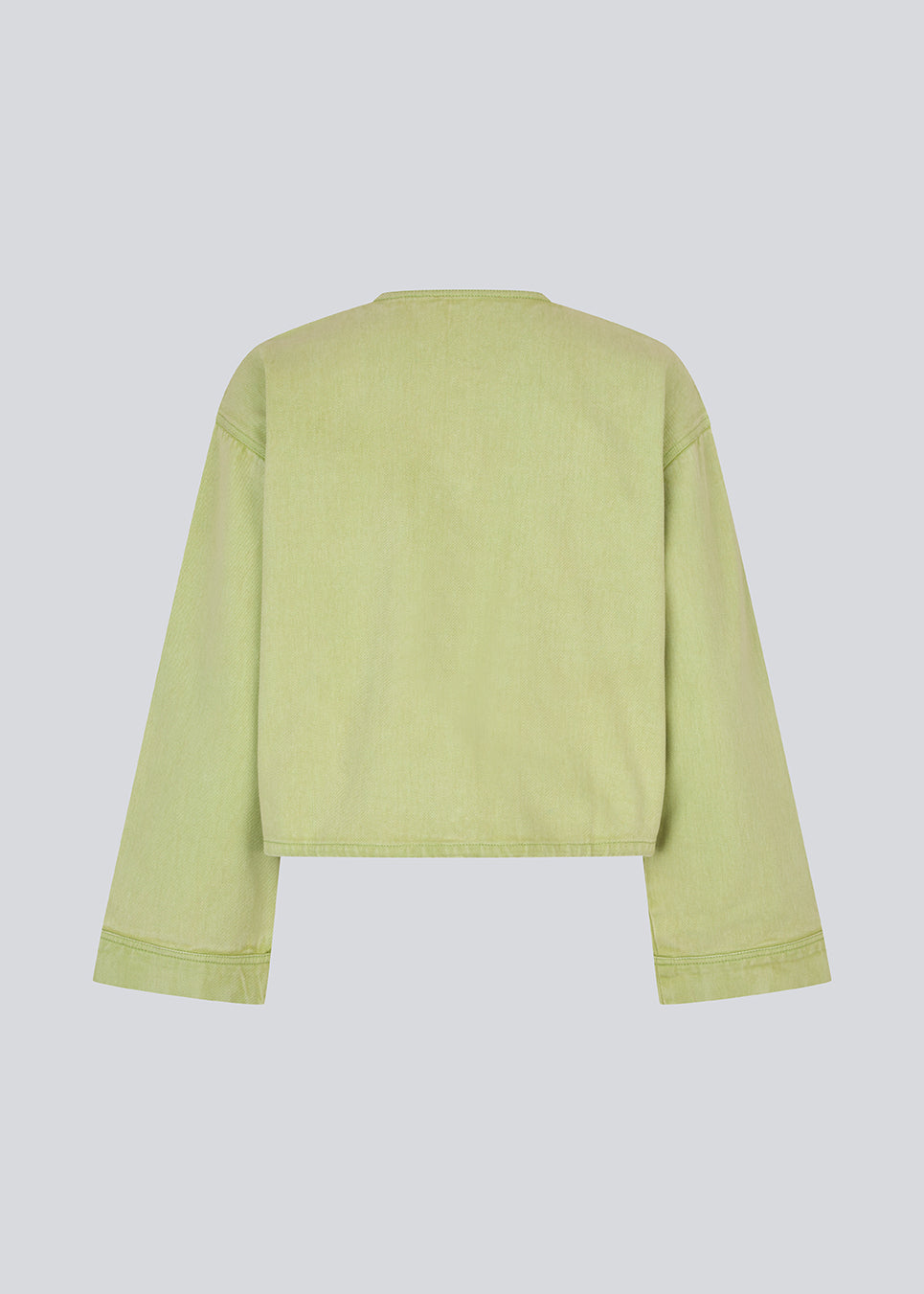 Denim jacket in green with an oversized fit. Princessmd short jacket has long wide sleeves, a round neckline, and adjustable elastic at the bottom. The model is 175 cm and wears a size S/36.

Style the jacket with matching pants in the same color: princessmd pants

Material:
100% Cotton