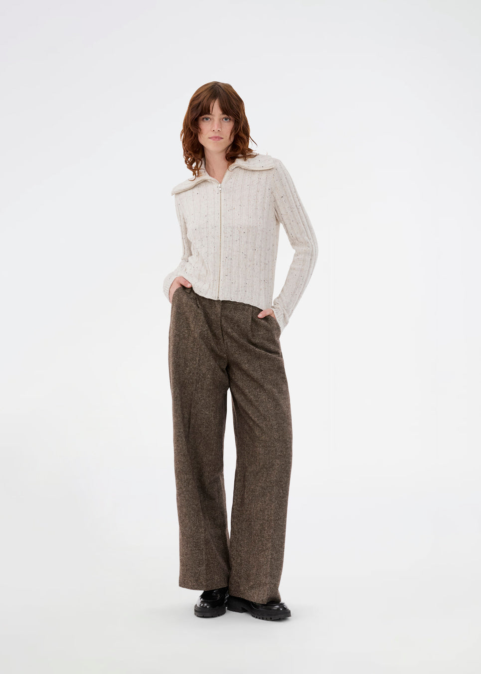 Rib knit cardigan with high neck. The Raulmd rollneck cardigan features a sleek, tight fit and fastens with a front zipper – perfect for a modern, everyday look.