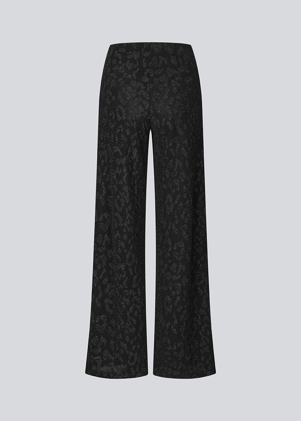 Elastic black trousers with wide legs. The Ricardomd pants are sleek with a metallic floral pattern – ideal for both everyday and festive occasions.