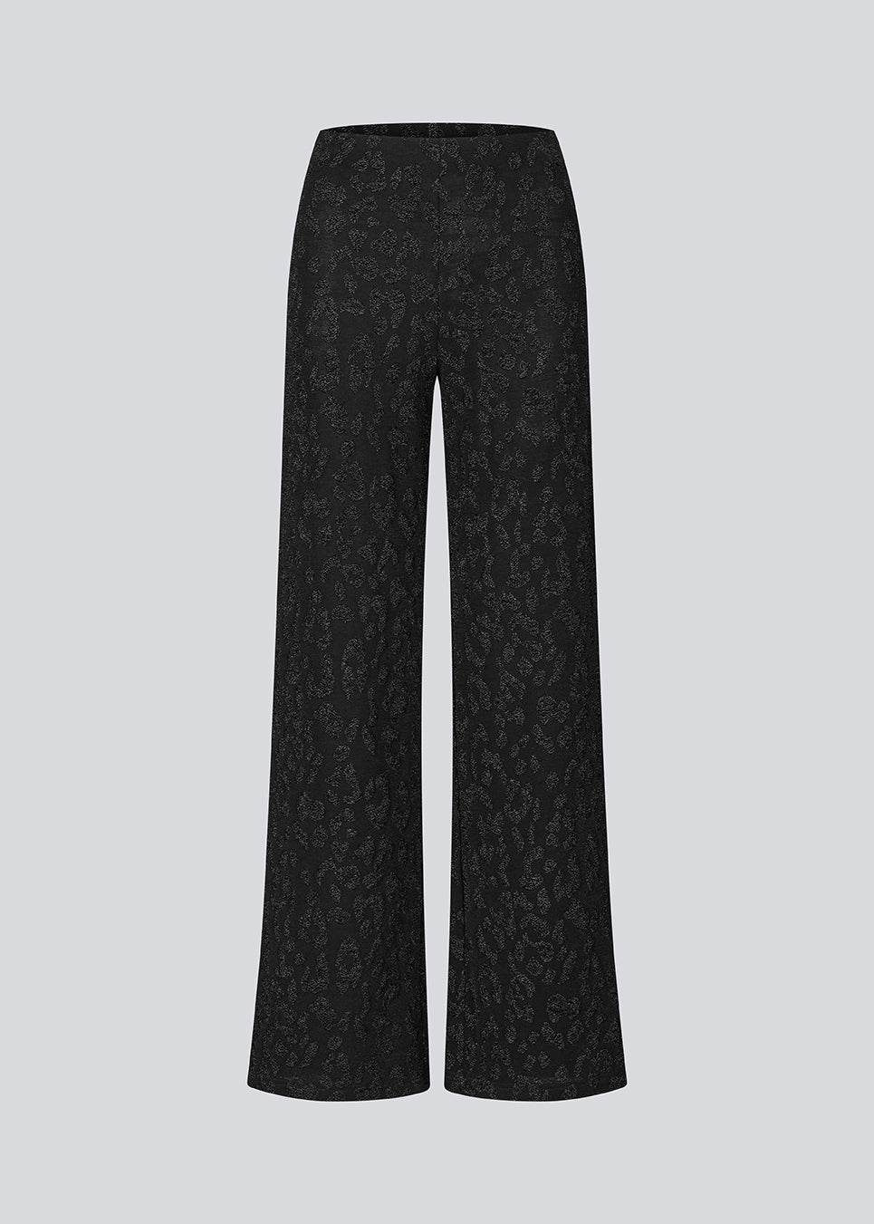 Elastic black trousers with wide legs. The Ricardomd pants are sleek with a metallic floral pattern – ideal for both everyday and festive occasions.