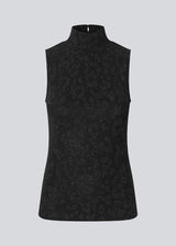 Sleeveless top with high neck. The Ricardomd top features a metallic floral pattern and a classic silhouette – perfect for both everyday wear and parties.