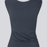 Elegant top in recycled polyester. The Richardmd top is fitted and features a striking gold buckle detail on the left shoulder – stylish and ideal for festive occasions.