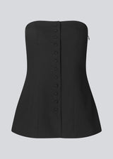 Black corset top with button details. The Ridermd top features a smocked back and invisible zipper – a flattering and timeless piece.