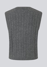 Fitted cable knit vest. The Risemd Vest features a timeless cable knit design and an embroidered logo on the chest – perfect for a cool, classic layered look.
