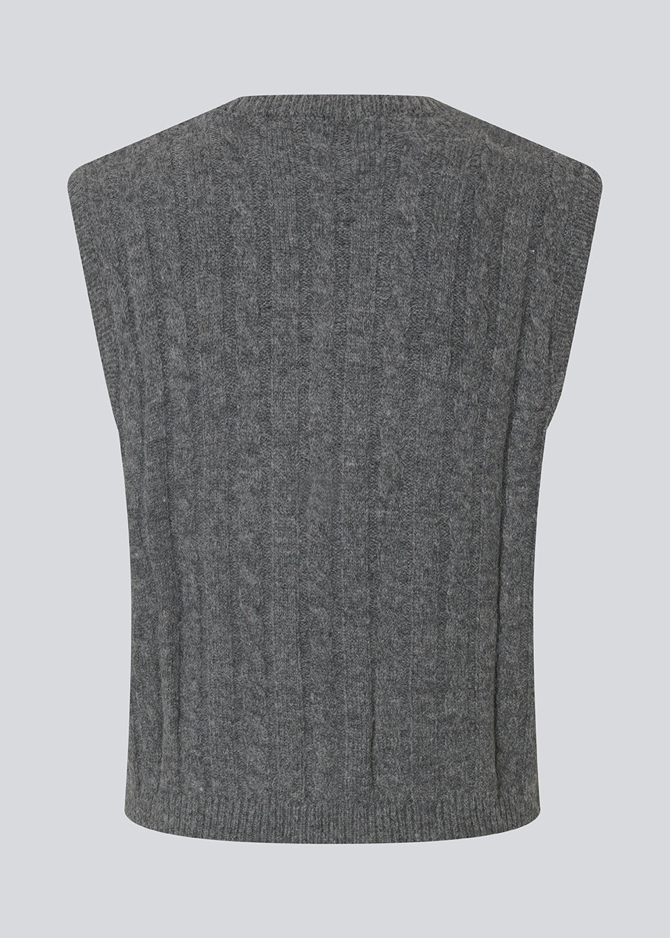 Fitted cable knit vest. The Risemd Vest features a timeless cable knit design and an embroidered logo on the chest – perfect for a cool, classic layered look.
