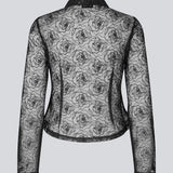 Black fitted shirt in sheer material. The Roccomd shirt features a classic collar and button closure with beautifully stitched rose embroidery – both feminine and stylish.