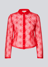 Red fitted shirt in sheer material. The Roccomd shirt features a classic collar and button closure with beautifully stitched rose embroidery – both feminine and stylish.