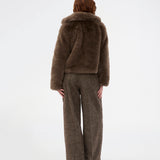 Wool trousers with wide legs. The Rockymd pants have a high waist, front pleats, and side pockets – a structured, classic pants with a timeless feel.