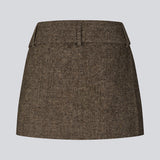 Mini skirt in wool. The Rockymd skirt features a wide belt with a decorative buckle – offering a cool and edgy look.