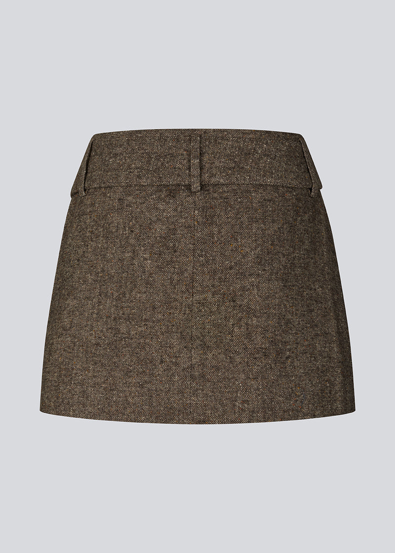 Mini skirt in wool. The Rockymd skirt features a wide belt with a decorative buckle – offering a cool and edgy look.