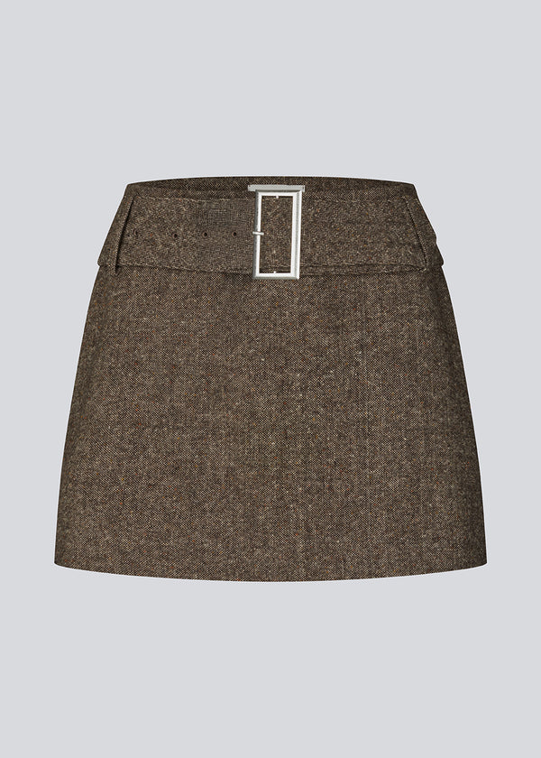 Mini skirt in wool. The Rockymd skirt features a wide belt with a decorative buckle – offering a cool and edgy look.
