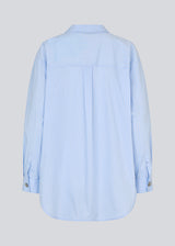 Long striped cotton shirt. The Rowanmd shirt features a classic collar and beautiful decorative buttons – giving it a feminine yet cool look.