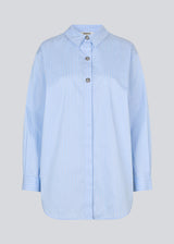 Long striped cotton shirt. The Rowanmd shirt features a classic collar and beautiful decorative buttons – giving it a feminine yet cool look.