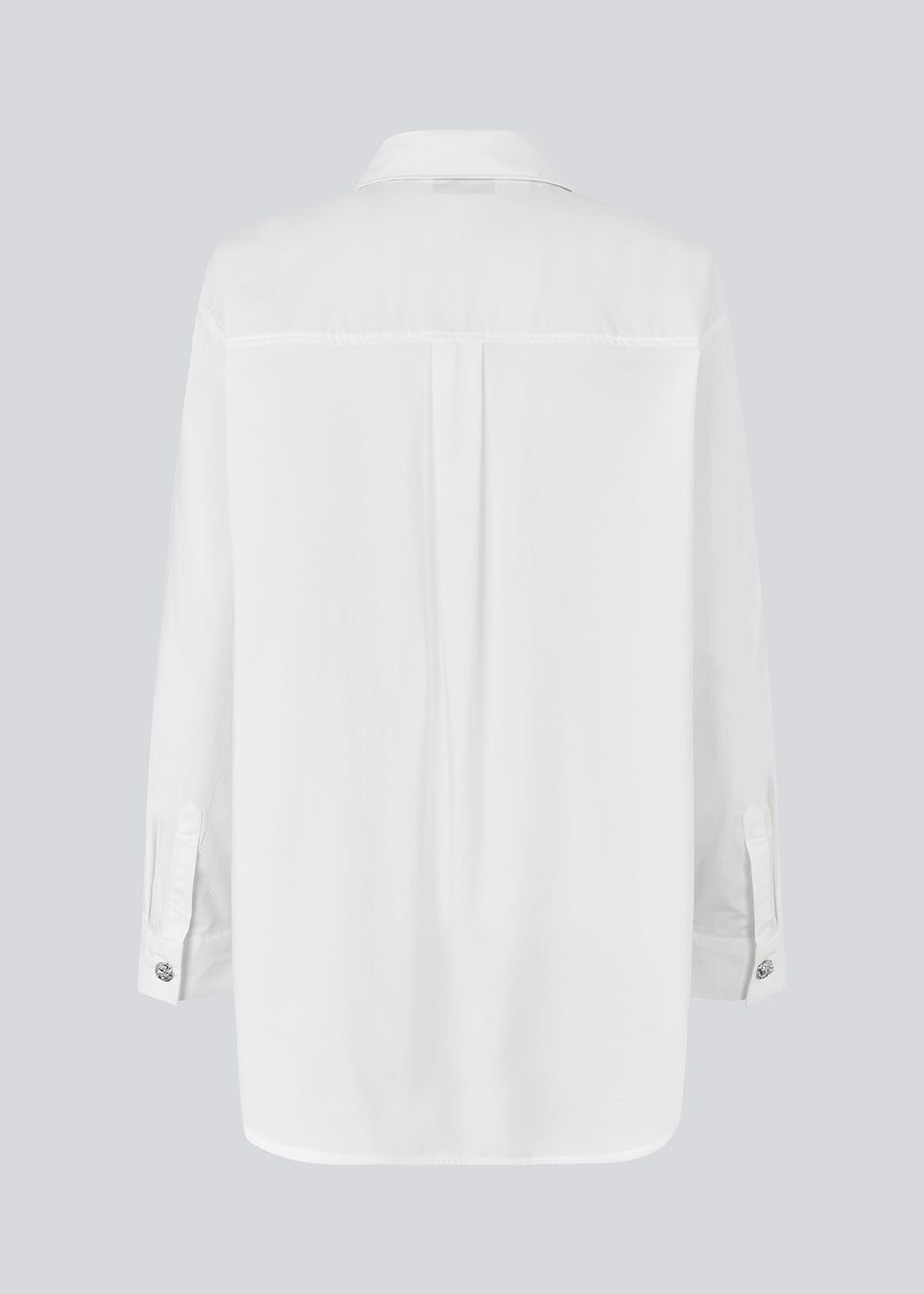 Long cotton shirt. The Rowanmd shirt features a classic collar and beautiful decorative buttons – giving it a feminine yet cool appearance.