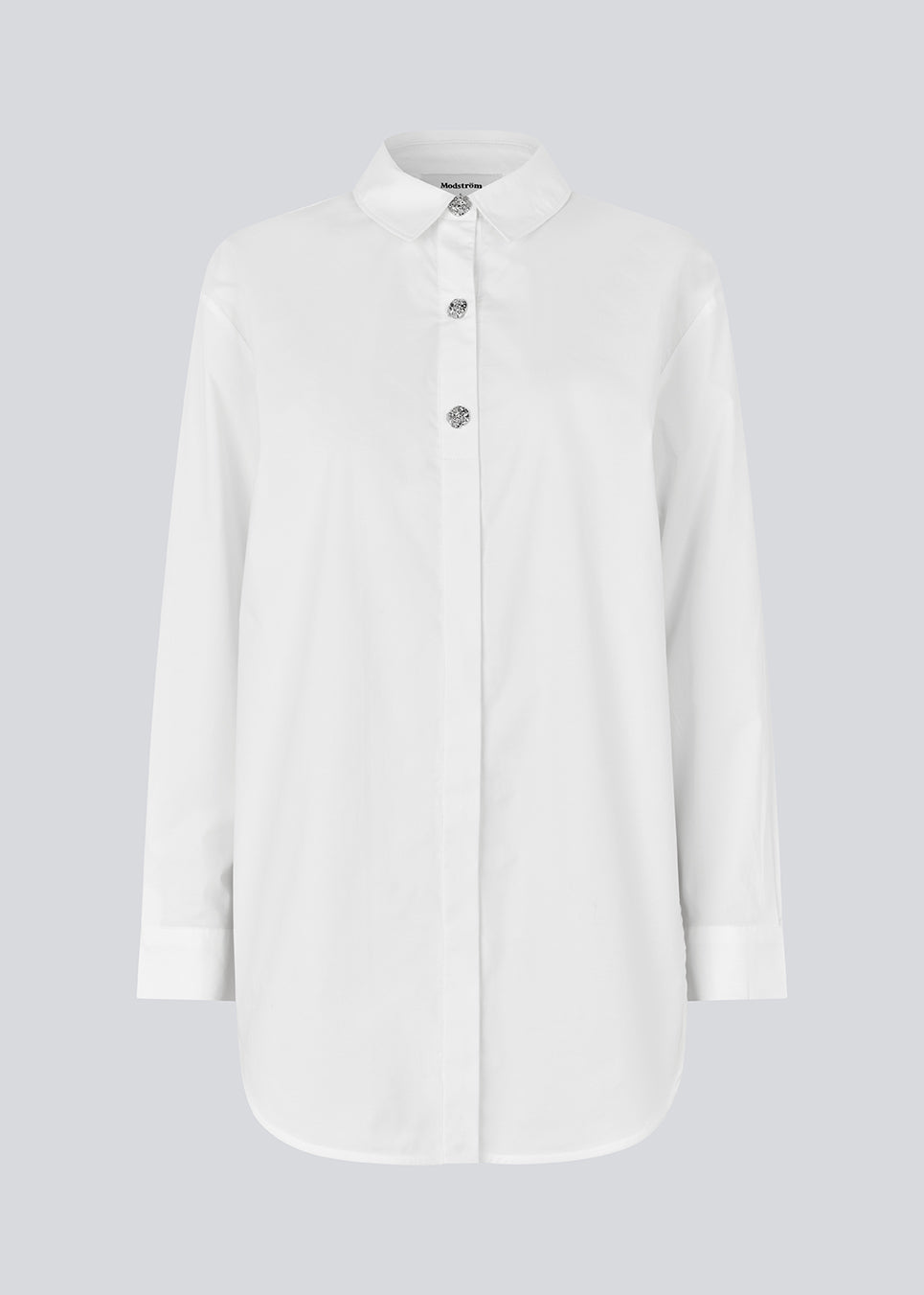 Long cotton shirt. The Rowanmd shirt features a classic collar and beautiful decorative buttons – giving it a feminine yet cool appearance.