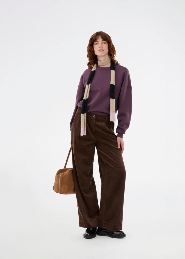 Suit trousers with pleats in corduroy. Pablomd wide pants has long wide legs with sidepockets.