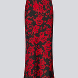 Long skirt in a beautiful rose print. The Ruthiemd skirt features an elastic waistband and is made from recycled polyester – a classic and elegant style.