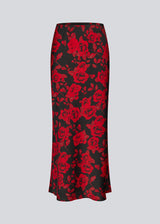 Long skirt in a beautiful rose print. The Ruthiemd skirt features an elastic waistband and is made from recycled polyester – a classic and elegant style.