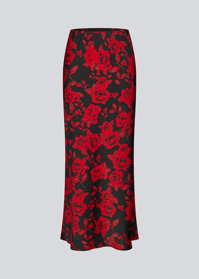 Long skirt in a beautiful rose print. The Ruthiemd skirt features an elastic waistband and is made from recycled polyester – a classic and elegant style.