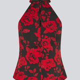 Halterneck top in a beautiful rose print. The Ruthiemd print top features an open back and is made from recycled polyester – graceful and classic.