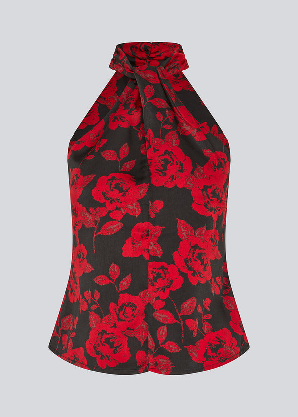 Halterneck top in a beautiful rose print. The Ruthiemd print top features an open back and is made from recycled polyester – graceful and classic.