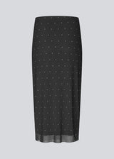 Form-fitting mesh skirt with polka dots and petticoat. Made from 92% recycled polyester, the Samalamd Print Skirt combines stretchability with comfort.