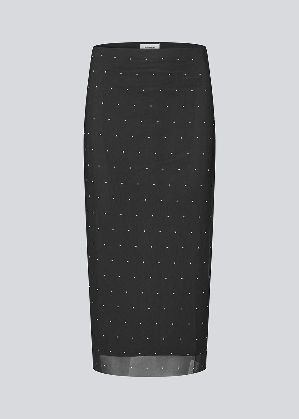 Form-fitting mesh skirt with polka dots and petticoat. Made from 92% recycled polyester, the Samalamd Print Skirt combines stretchability with comfort.