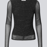 Long-sleeved mesh top with polka dots. The Samalamd print top has a scrunch detail on the front and a sewn-on undershirt for a non-see-through look. Made from 92% recycled polyester. Perfect for both everyday and special occasions.
