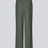Loose everyday trousers in mos green. Sebastianmd pants have an elastic waist for a perfect fit and a casual look that can easily be styled up with an elegant, printed shirt or top. Your new go-to trousers for both everyday and special occasions.