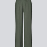 Loose everyday trousers in mos green. Sebastianmd pants have an elastic waist for a perfect fit and a casual look that can easily be styled up with an elegant, printed shirt or top. Your new go-to trousers for both everyday and special occasions.