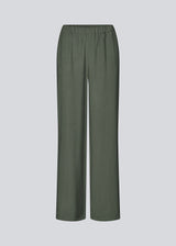 Loose everyday trousers in mos green. Sebastianmd pants have an elastic waist for a perfect fit and a casual look that can easily be styled up with an elegant, printed shirt or top. Your new go-to trousers for both everyday and special occasions.