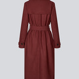 Classic, double-breasted wool coat with collar and notch lapels. ShayMD coat has a wide tiebelt at waist, shoulder straps, wide cuffs and open yoke. With lining and single back vent.