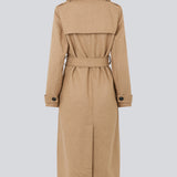 Classic, double-breasted wool coat with collar and notch lapels. ShayMD coat, in the color Brown Sugar, has a wide tiebelt at waist, shoulder straps, wide cuffs and open yoke. With lining and single back vent.
