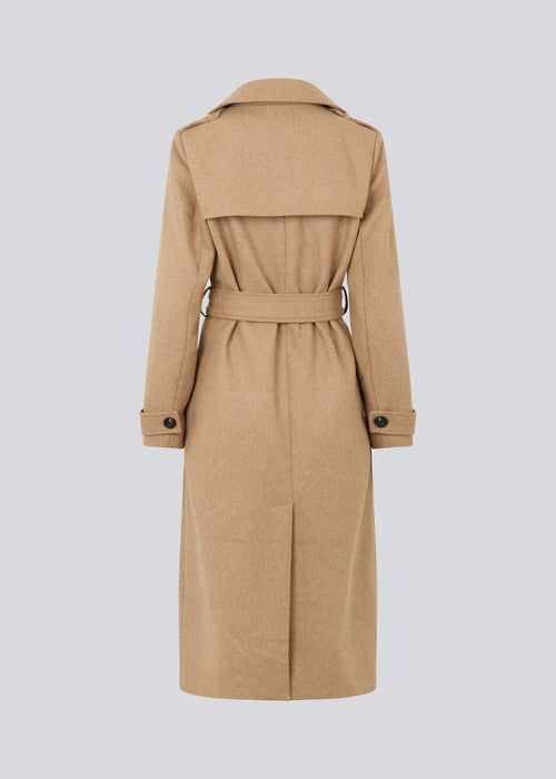 Classic, double-breasted wool coat with collar and notch lapels. ShayMD coat, in the color Brown Sugar, has a wide tiebelt at waist, shoulder straps, wide cuffs and open yoke. With lining and single back vent.