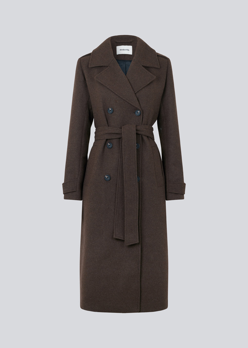 Brown classic, double-breasted wool coat with collar and notch lapels. ShayMD coat, in the color Dark Coffee, has a wide tiebelt at waist, shoulder straps, wide cuffs and open yoke. With lining and single back vent.
