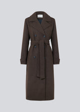 Classic, double-breasted wool coat with collar and notch lapels. ShayMD coat, in the color&nbsp;Dark Coffee, has a wide tiebelt at waist, shoulder straps, wide cuffs and open yoke. With lining and single back vent.