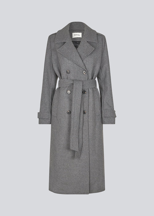 Classic, double-breasted wool coat in grey with collar and notch lapels. ShayMD coat has a wide tiebelt at waist, shoulder straps, wide cuffs and open yoke. With lining and single back vent.