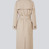 Classic, double-breasted wool coat in beige with collar and notch lapels. ShayMD coat has a wide tiebelt at waist, shoulder straps, wide cuffs and open yoke. With lining and single back vent.