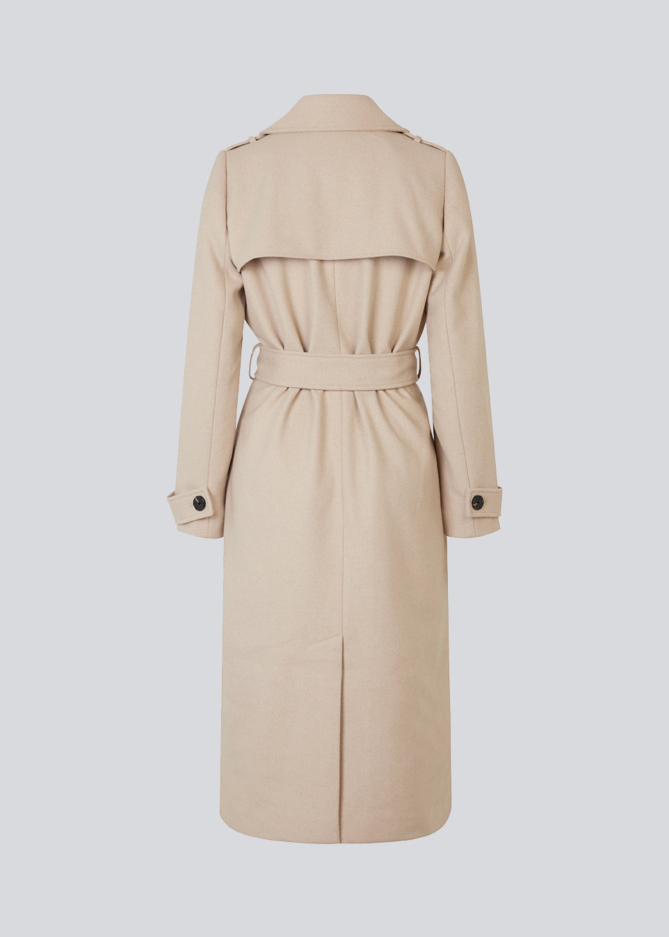 Classic, double-breasted wool coat in beige with collar and notch lapels. ShayMD coat has a wide tiebelt at waist, shoulder straps, wide cuffs and open yoke. With lining and single back vent.