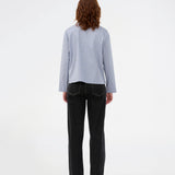 Checkered shirt with a loose fit. The Shepardmd shirt has a collar, chest pocket and hidden button closure. It stops at the hip and gives a cool look with jeans. The shirt has cool details on the side with buttons.