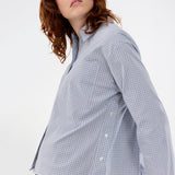 Checkered shirt with a loose fit. The Shepardmd shirt has a collar, chest pocket and hidden button closure. It stops at the hip and gives a cool look with jeans. The shirt has cool details on the side with buttons.