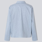 Checkered shirt with a loose fit. The Shepardmd shirt has a collar, chest pocket and hidden button closure. It stops at the hip and gives a cool look with jeans. The shirt has cool details on the side with buttons.