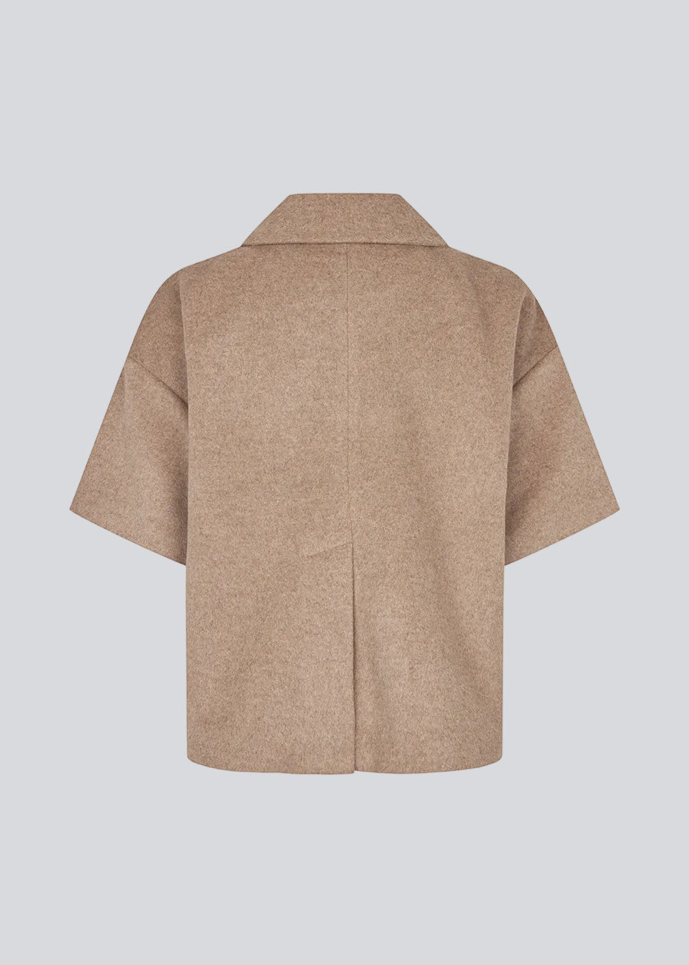 Short-sleeved cape jacket in beige/brown in a soft wool blend. The Siljamd cape has a collar, pockets, and nice brown buttons. Perfect layering over a knit for an elegant, seasonal look.