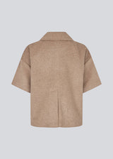 Short-sleeved cape jacket in beige/brown in a soft wool blend. The Siljamd cape has a collar, pockets, and nice brown buttons. Perfect layering over a knit for an elegant, seasonal look.