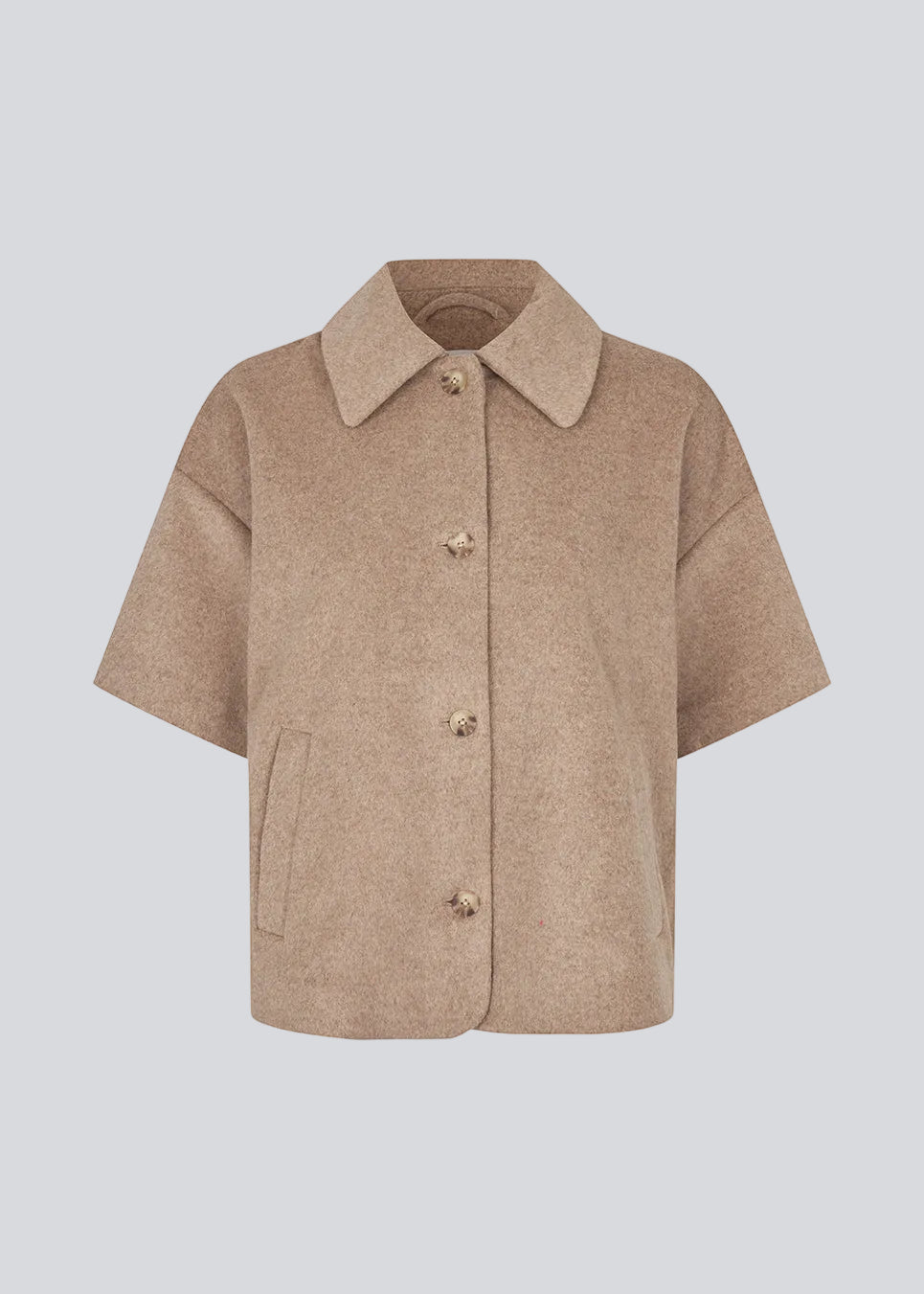 Short-sleeved cape jacket in beige/brown in a soft wool blend. The Siljamd cape has a collar, pockets, and nice brown buttons. Perfect layering over a knit for an elegant, seasonal look.