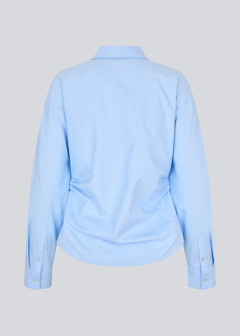 Classic fitted shirt. The Siobanmd shirt has ruched side details, long sleeves, and a button closure – elegant and versatile.