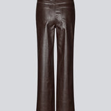 Faux leather trousers in dark brown with crocodile print. Sixstenmd pants have straight legs, pockets, belt loops and hidden zipper. A cool pair of trousers that will give your outfit plenty of edge.