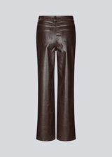 Faux leather trousers in dark brown with crocodile print. Sixstenmd pants have straight legs, pockets, belt loops and hidden zipper. A cool pair of trousers that will give your outfit plenty of edge.